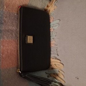 Dooney and Bourke Carrington pouch in black pebble leather